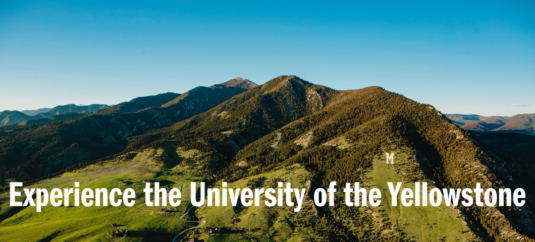 Aerial shot of the Bridger Mountains, with the words "Experience the University of the Yellowstone"