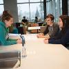 students hanging out at the Gallatin Hall shared kitchen