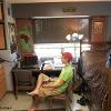 langford resident playing video games in room