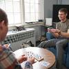 two residents playing cards