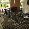 Main stairs through the middle of Yellowstone looking at fireplace.