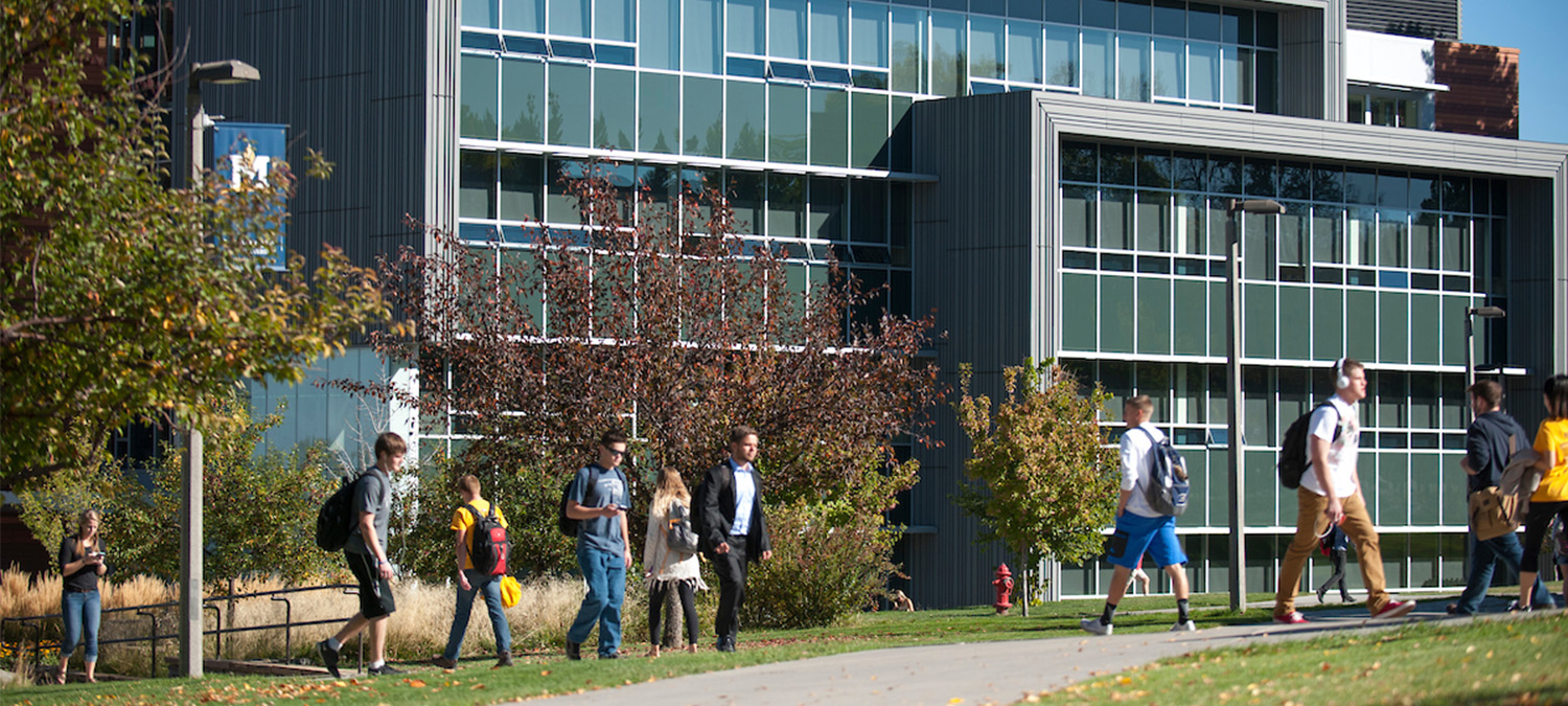 Students Walking in front of building