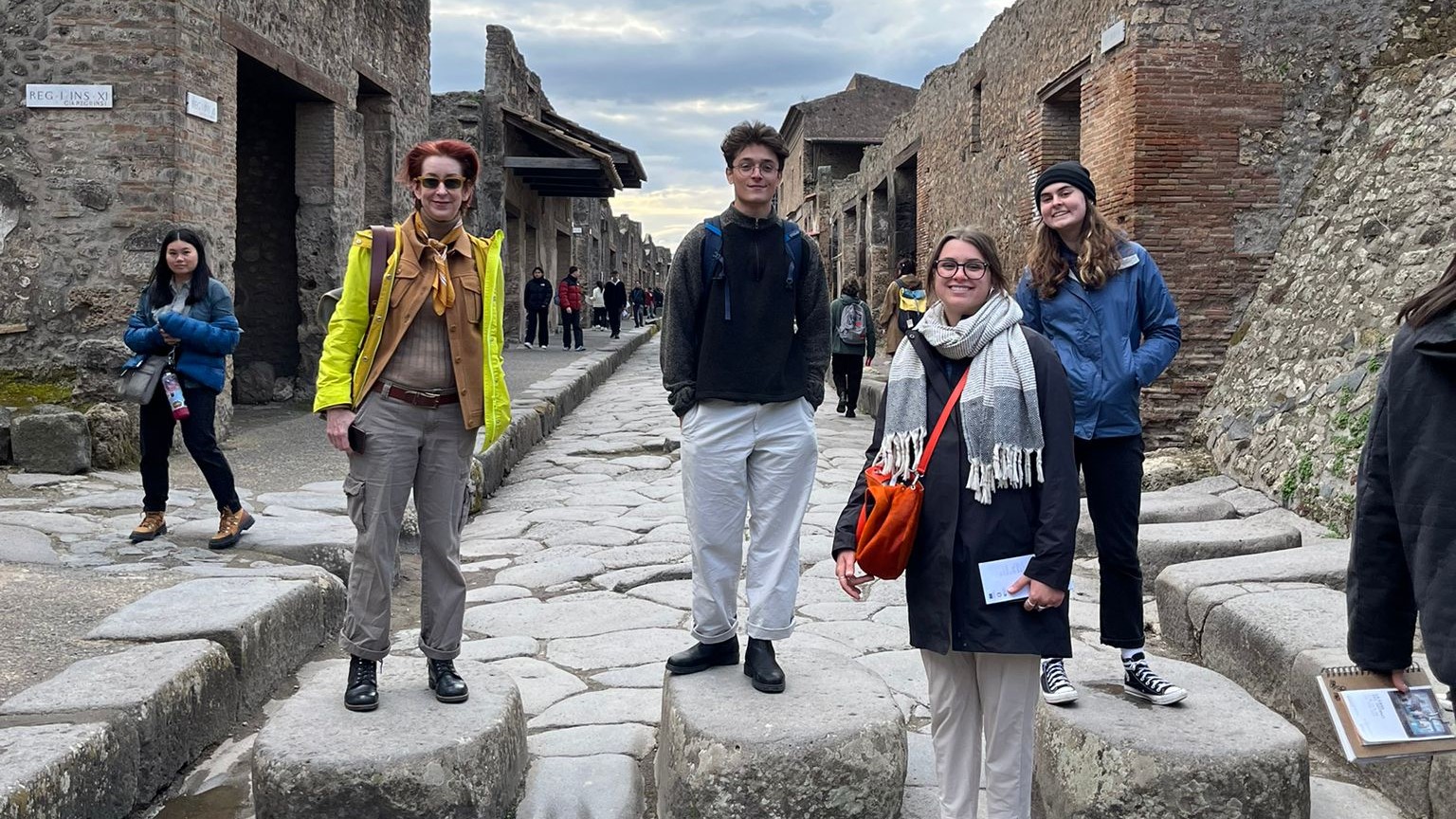 Dr. Regina Gee in Pompeii, Italy, during Field Study abroad class with students. 