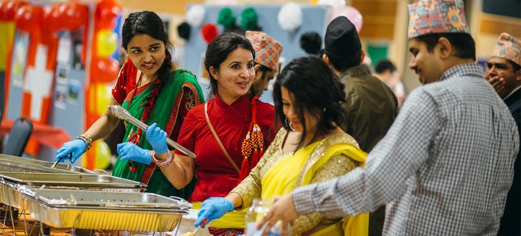 Student booth at 34th annual International Food Bazaar