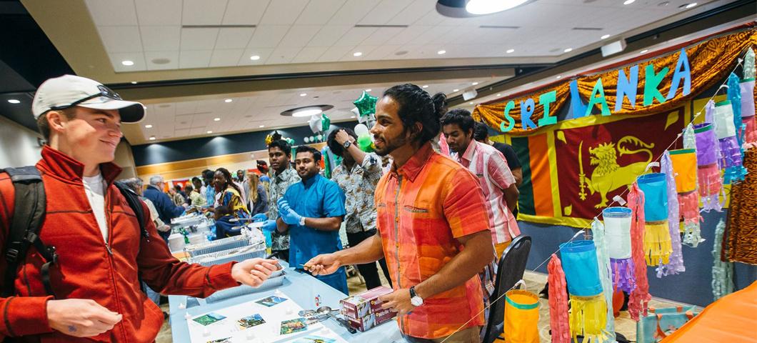 Student booth at 34th annual International Food Bazaar