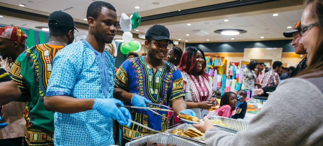 Student booth at 34th annual International Food Bazaar