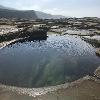 A picture of a swimming hole in the Australian landscape