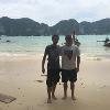A photo of Nathaniel and his friend on the beach in Southeast Asia
