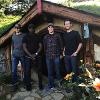 A photo of Nathaniel with some of his new friends outside the Hobbit House