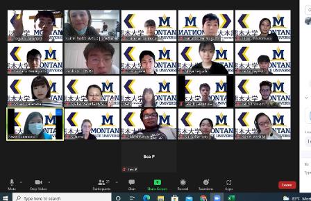 Many people pose for a screenshot on ZOOM, with a matching background that shows the MSU logo and the logo of a Japanese university. Everyone looks shy haha.