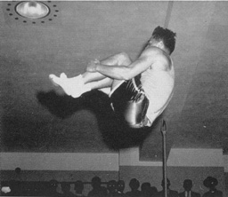 At the top of a double flip, 1955