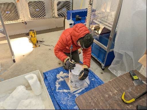 Experimenter with snow sample
