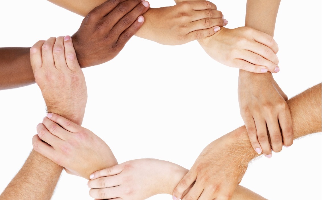 linked hands of many skin tones to show support