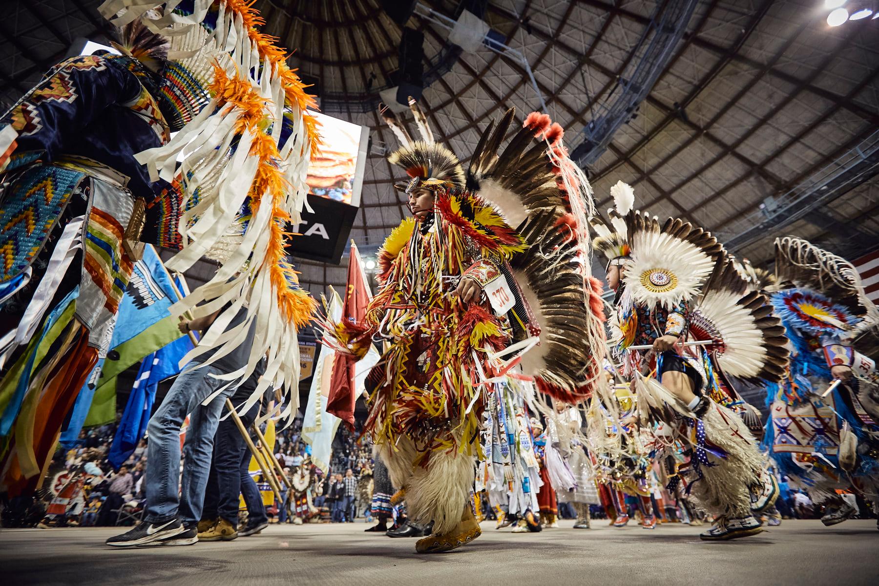 fancy dancers at AIC powwow