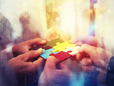 hands on puzzle pieces