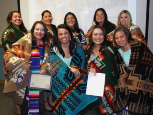 Caring for Our Own Graduates in native blankets