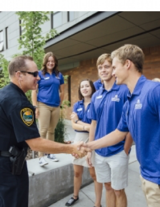 police officer with students