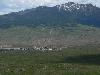 Far away shot of Bozeman with a mountain in the background.