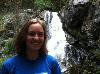 Christina in front of a waterfall