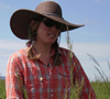 girl with hat and flannel