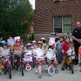 msu police with kids on bikes