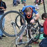 police officer inspecting bike for safety