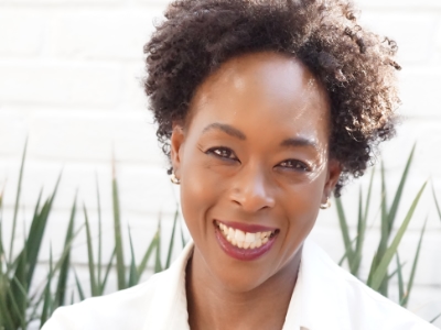 Margot Lee Shetterly, a woman in a white jacket.
