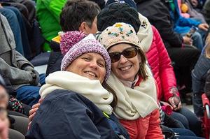 Alison Harmon and Suzanne Held watching the football game