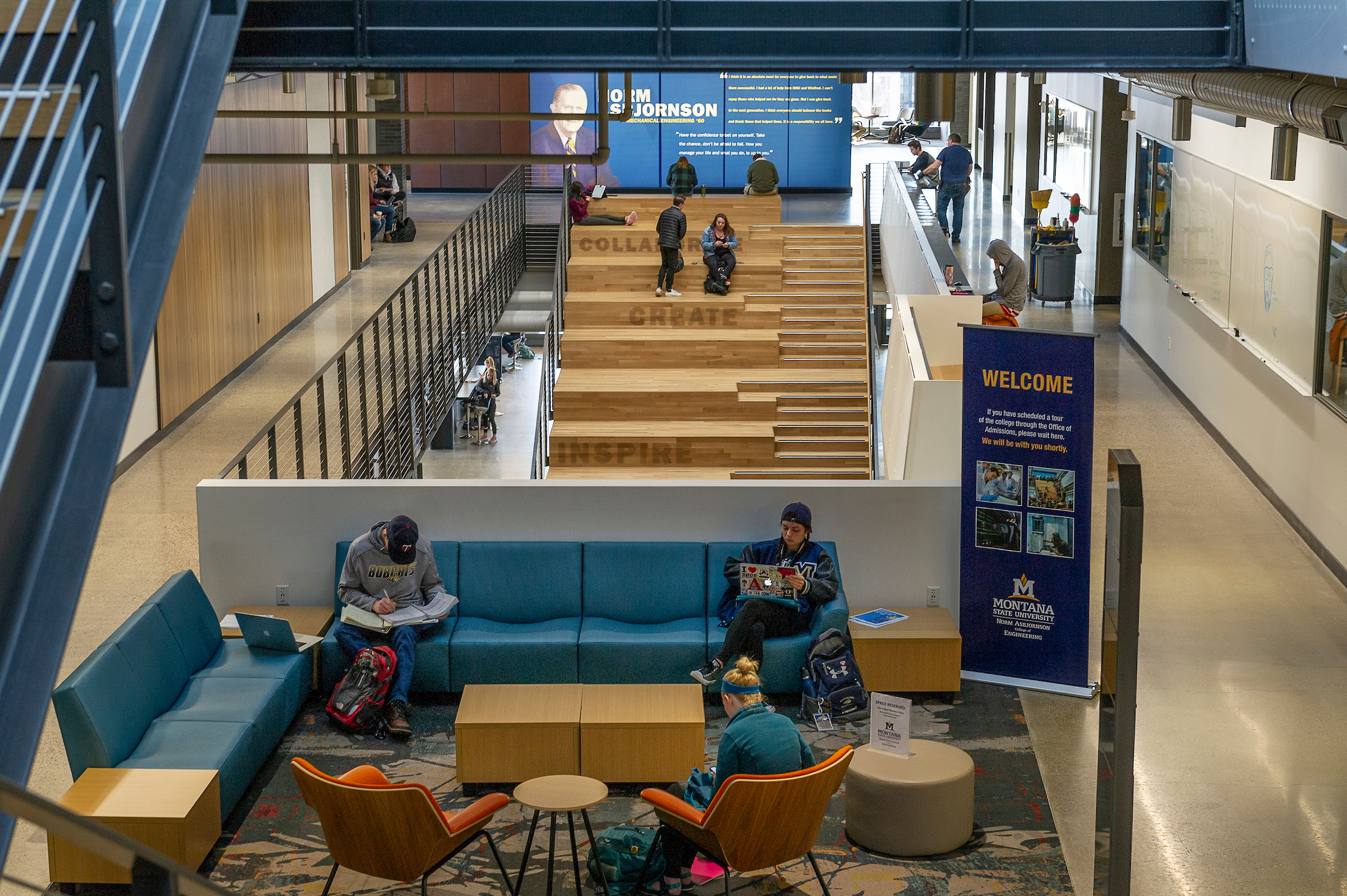 students sitting on couches in building