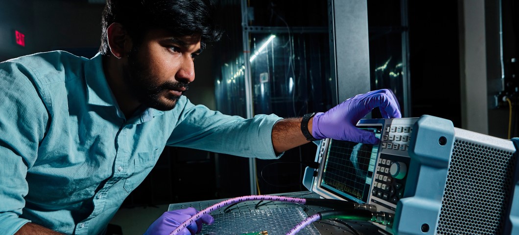 Man with computer equipment in Quantum Foundry