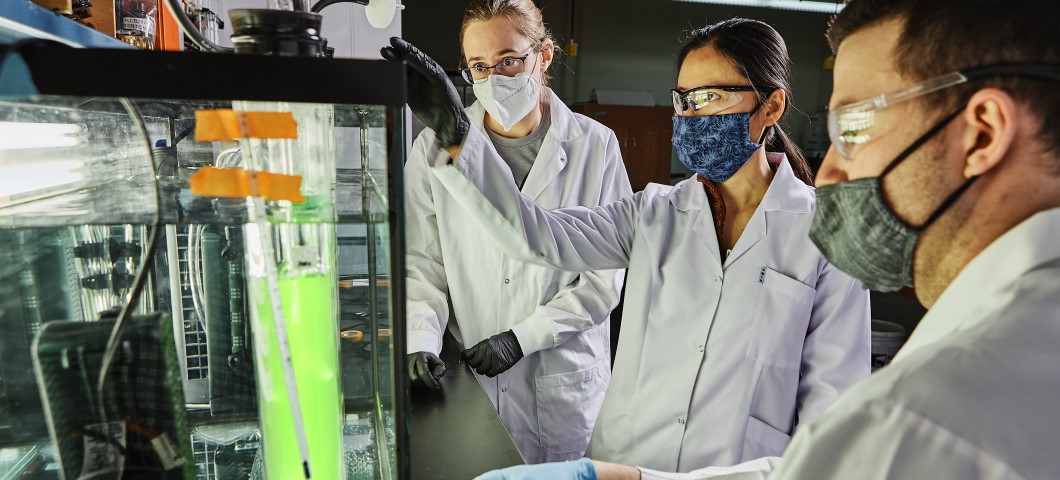 Three people in lab