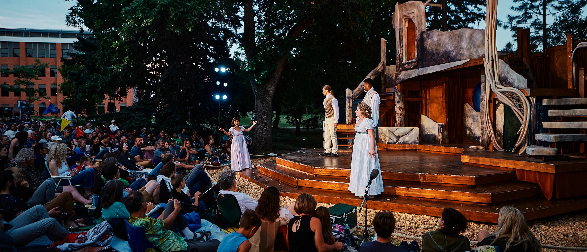 stage with actors and audience
