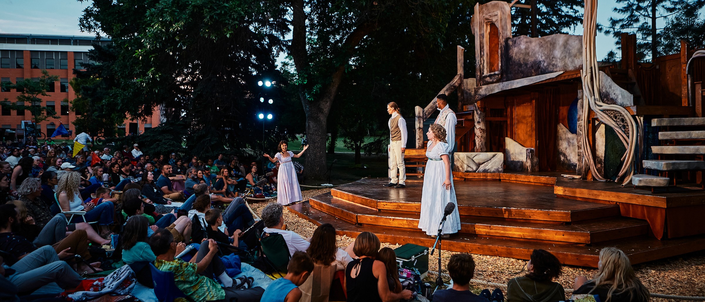 stage with actors and audience