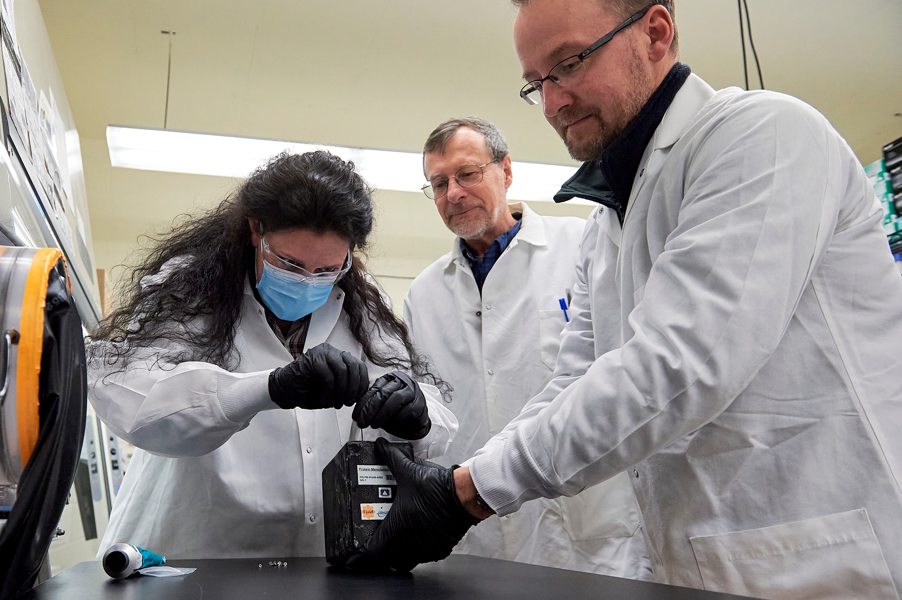 3 researchers in lab