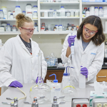 Two teachers working in the lab