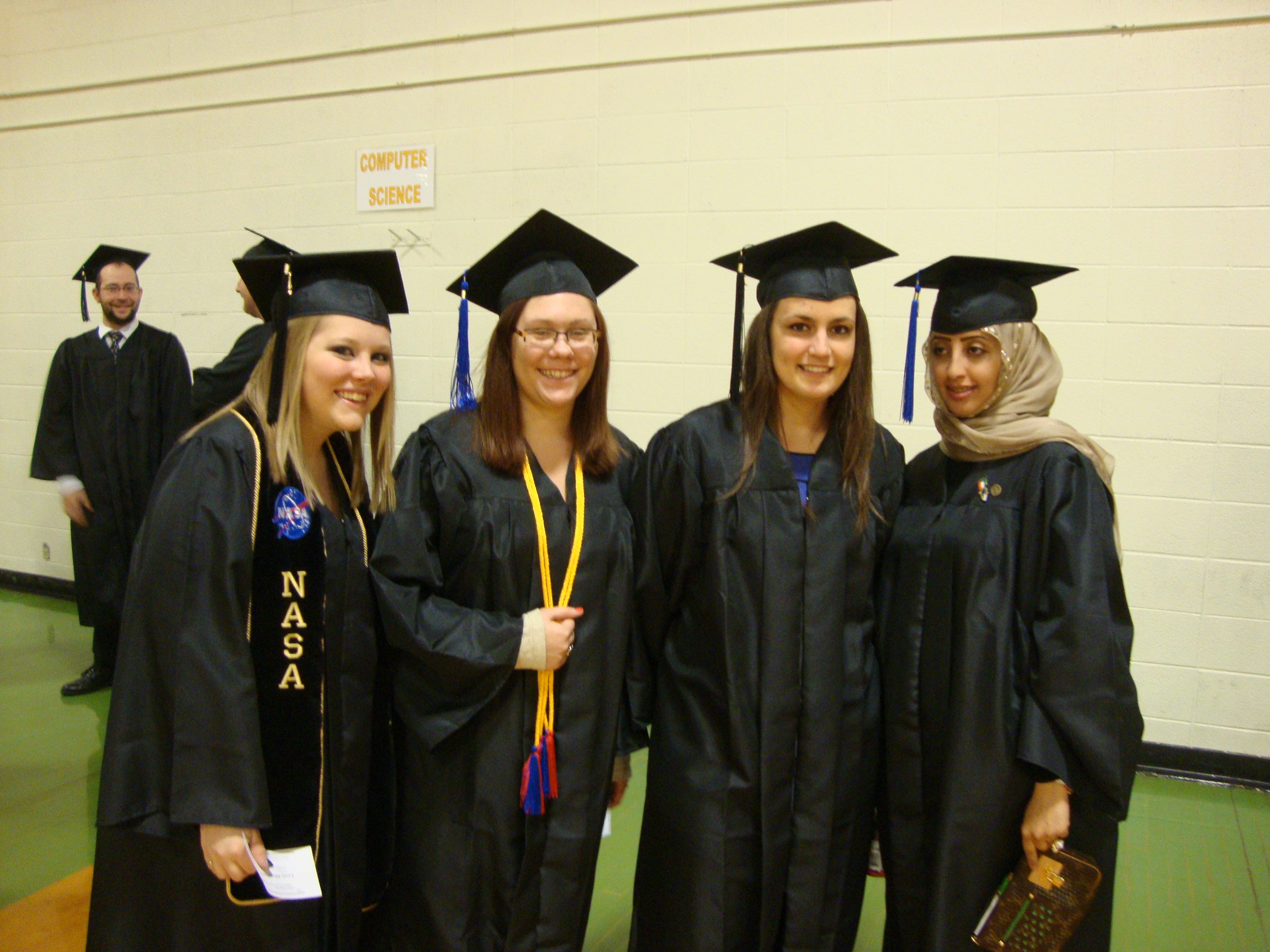 Students in caps and gowns for graduation