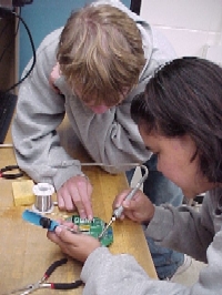 student soldering
