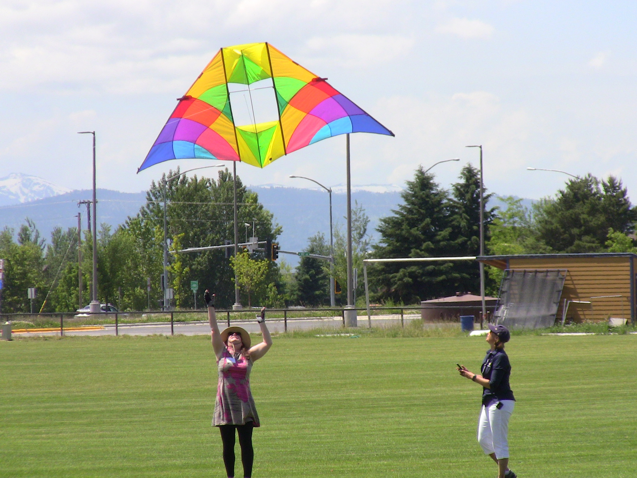 two people flying a kite