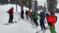 Snow Science students learning about avalanche terrain from the Bridger Bowl Ski Patrol Director, Bridger Bowl, MT