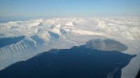 Flying over one of the many glaciers on Svalbard, a remote archipelago in the Arctic at 78N, Norway