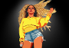 Beyonce in yellow with a microphone