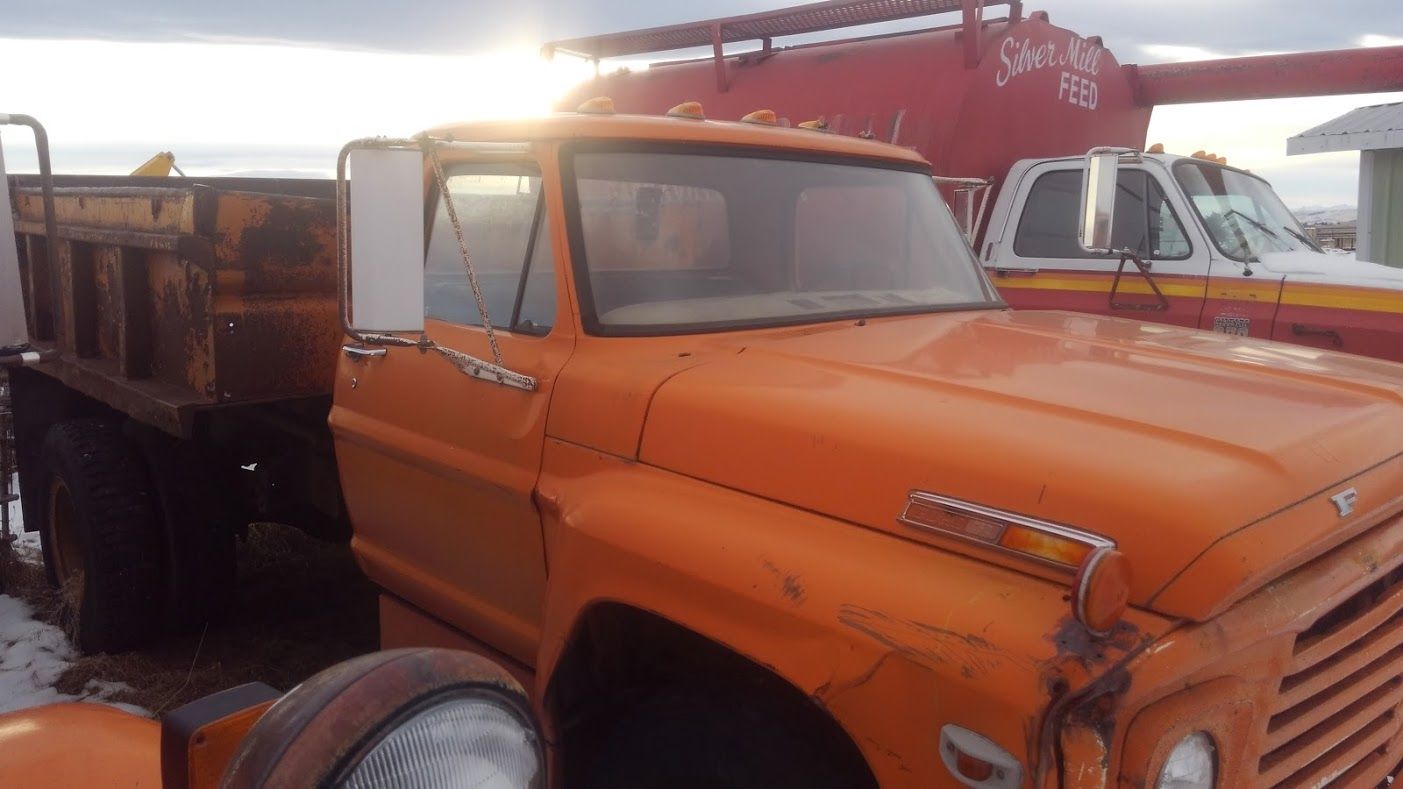 orange 1975 ford dump truck