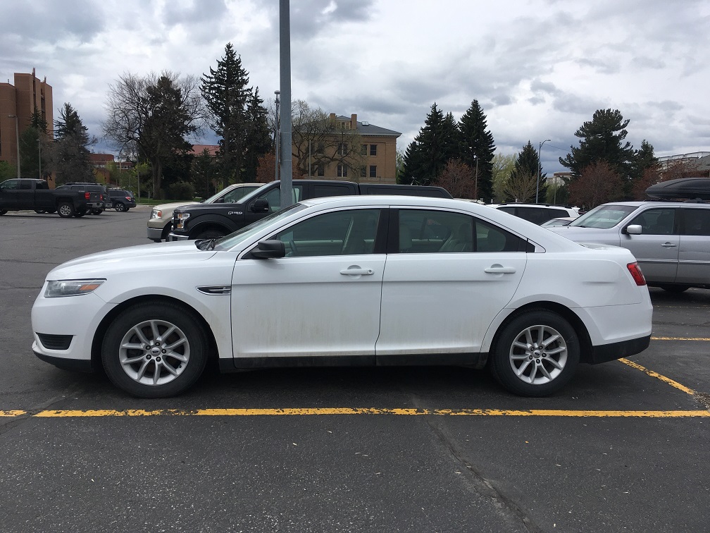 white ford taurus sid view