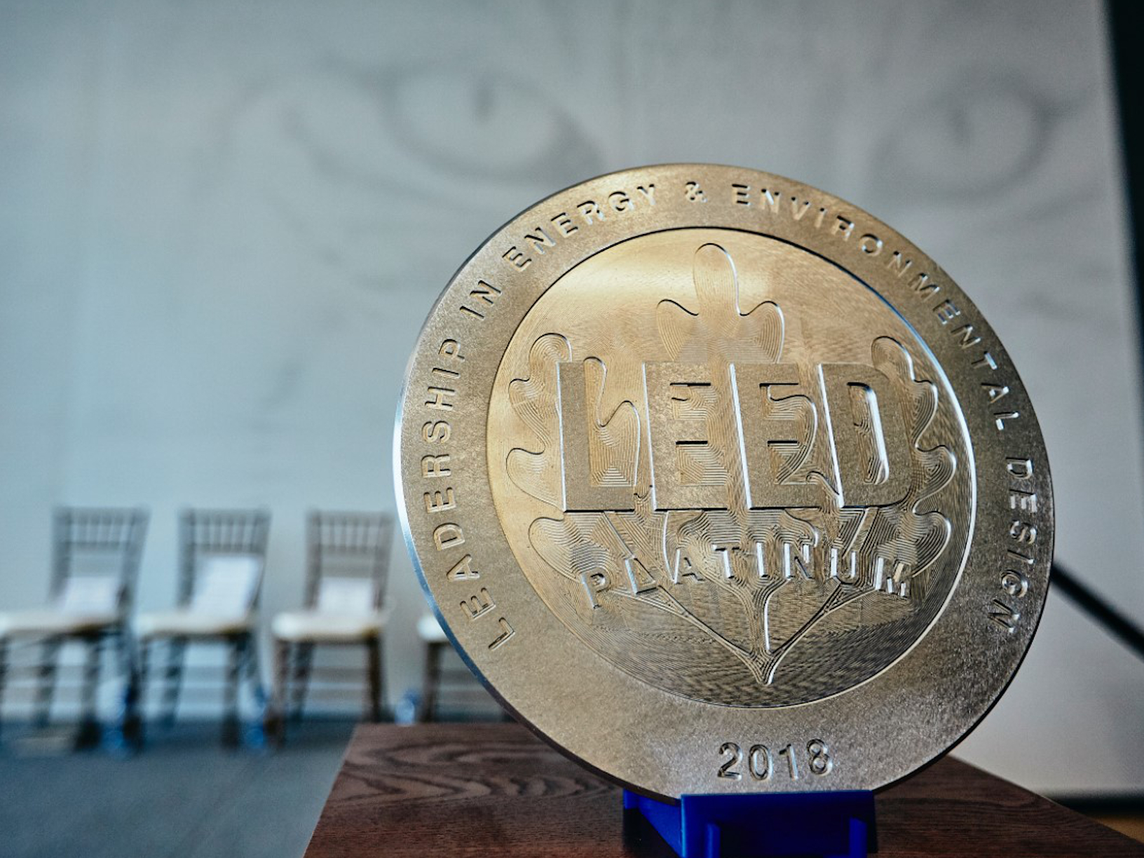 A LEED medallion sitting on a table