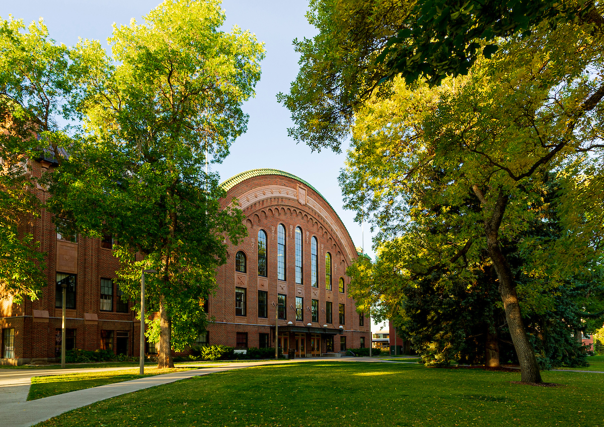 Exerior image of a brick academic building on a college campus.