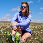 photo of Kayla in field of wildflowers
