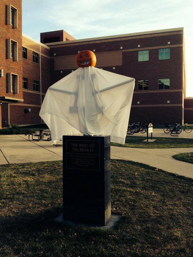 Photo courtesy of COE FaceBook Page A photo of the Tau Beta Pi Bent decorated for Halloween 2014 sitting outside the Cobleigh courtyard at MSU.