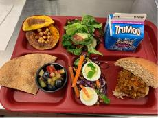 A photo of a lunch tray with a variety of fresh, scratch cooked foods. 