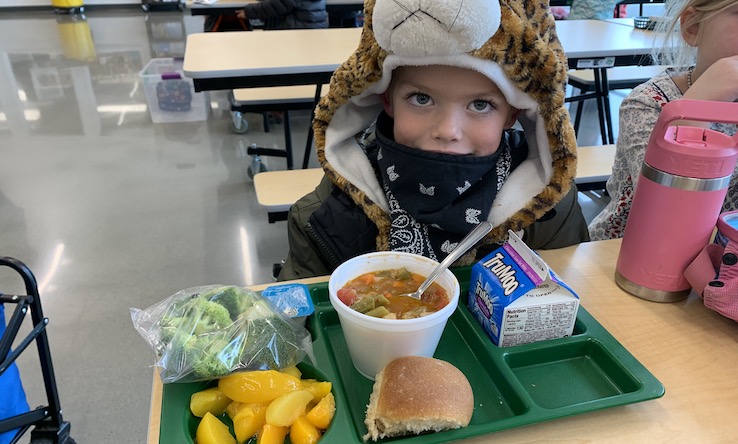 Student sampling MT Harvesting Recipes Bison Barley Soup