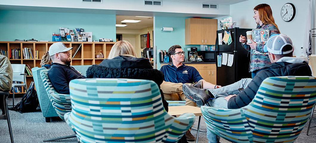 Students socialize in the commons of the Travis W. Atkins Veteran Support Center.